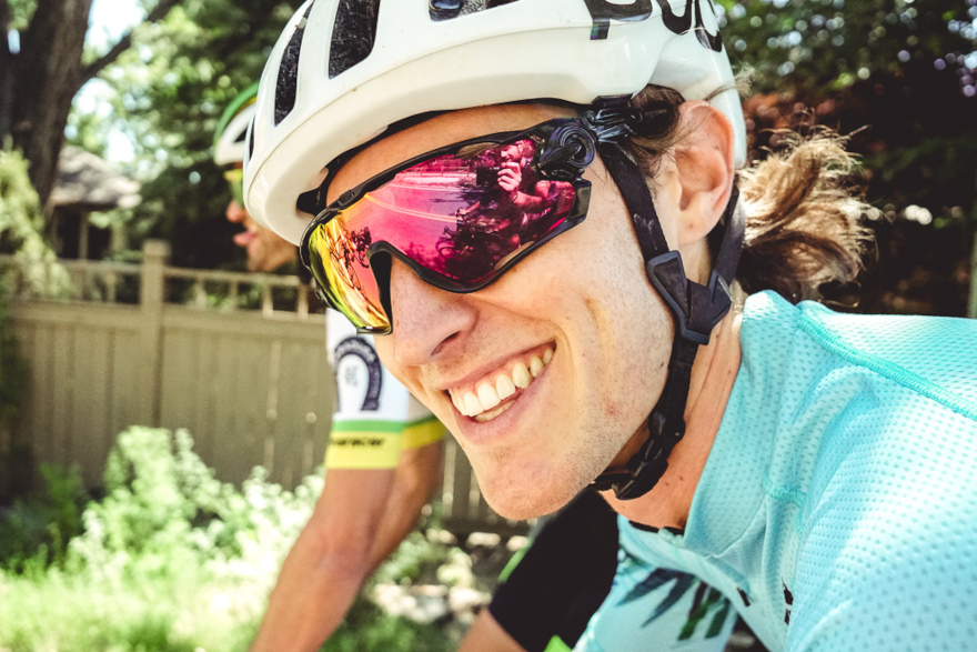 Man with cycling helmet and sunglasses