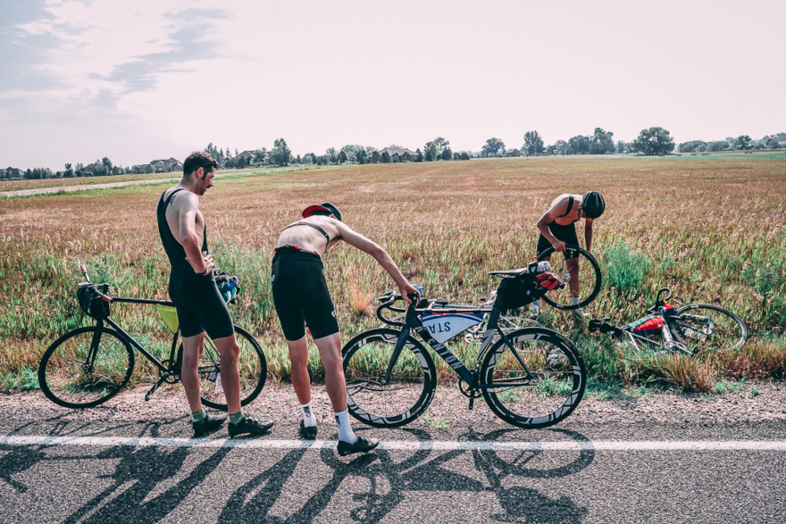 Cyclists stopped on road shoulder