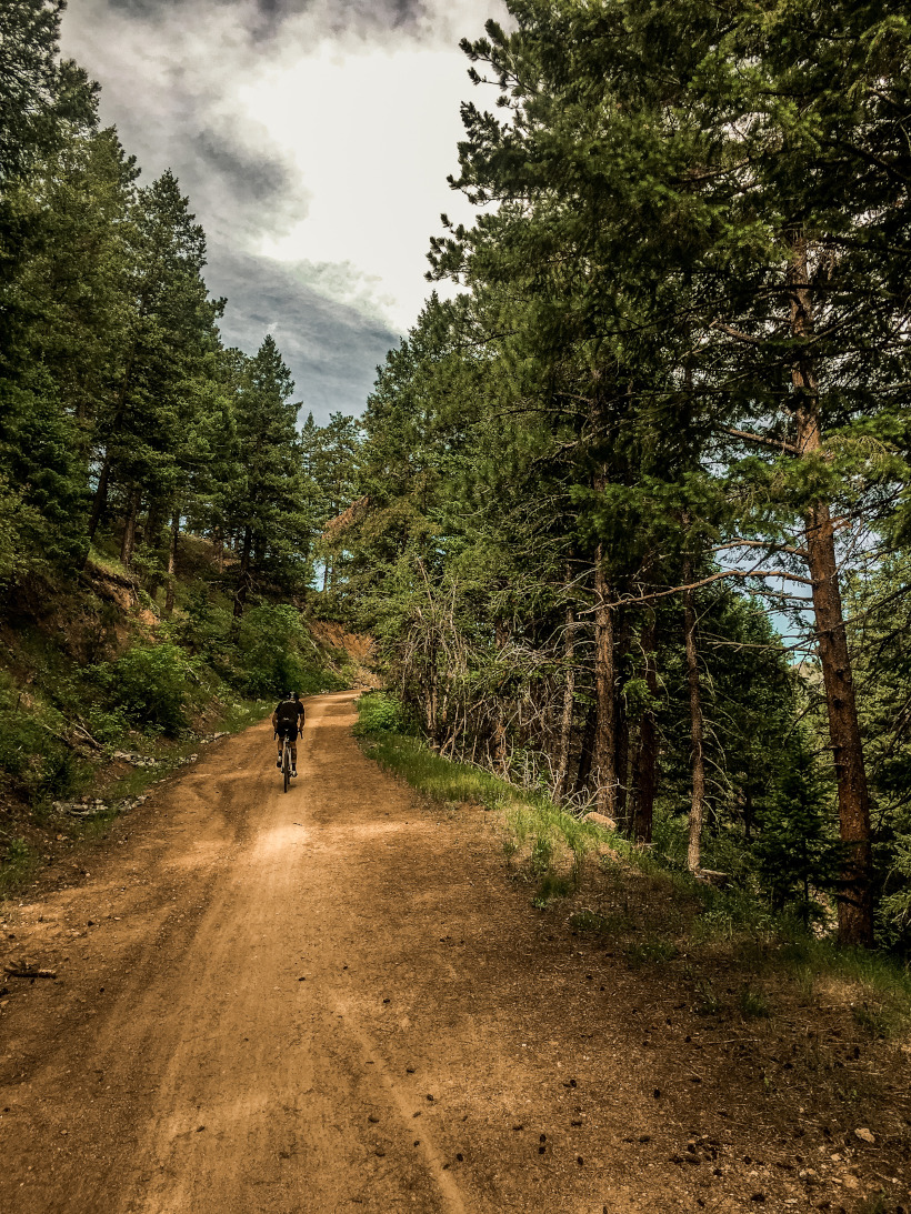 Cyclist on dirt road