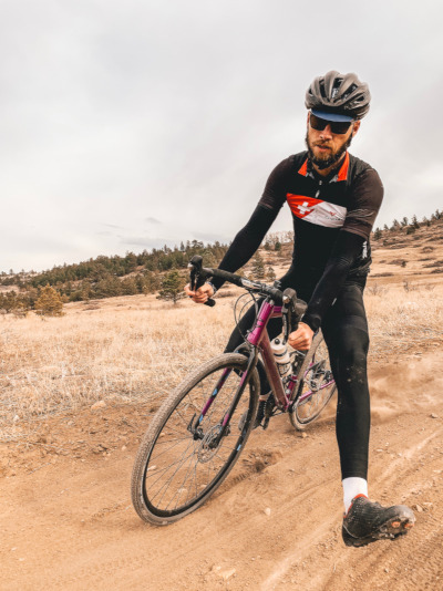 Cyclist on dirt road